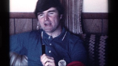 1976: Man Sitting on Couch Talking into Microphone Kentucky