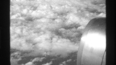 1971: view of clouds out of airplane window NEW YORK CITY
