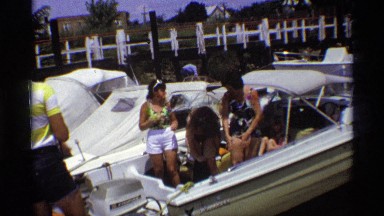 1971: people are standing outside and they're mostly wearing beach clothes
