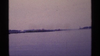 1971: zooming into a boulder and a quick shot of a boat stationary in the water