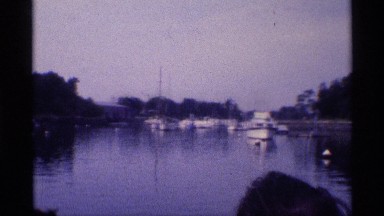 1971: first person point of view video of people on a boat, enjoying the scenery
