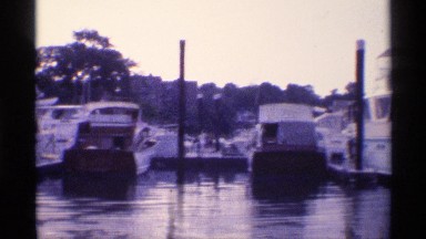 1971: The Board Moves in Slow Motion at the Harbor, Another Side, Stop Board Back