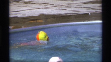 1971: kid swim in river and ride NEW YORK