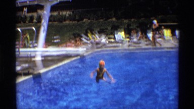 1971: Girl Diving from Board into Swimming Pool During Summer Holiday in New York