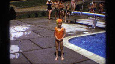 1971: kid left alone in a swimming pool NEW YORK