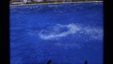1971: brother and sister having fun in a swimming pool on a holiday NEW YORK