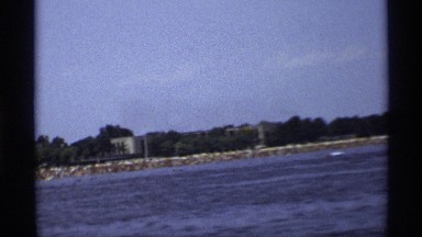 1971: panning the beach really fast while on a boat NEW YORK