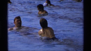 1971: peoples swim and enjoys the pool at the theme parks happy moment. NEW YORK