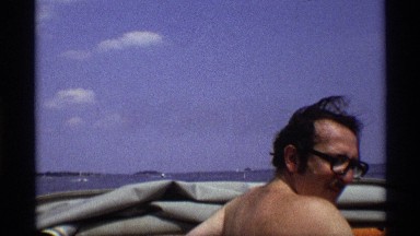 1971: man traveling on boat at the water more people also there they enjoying