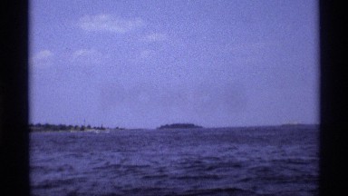 1971: a small children go to the board driving for in the ocean