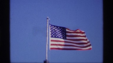 1969: patriotic american flag wavering in the wind. JORDAN MINNESOTA