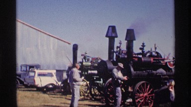 1969: engineers are standing at the transport vehicle and doing repair