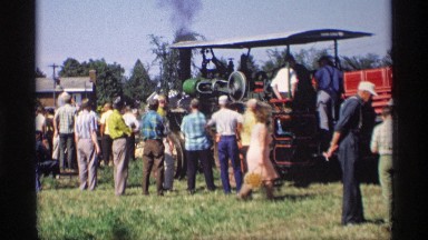 1969: crowd of people gather around an old-fashioned tractor MABEL MINNESOTA