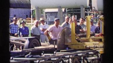 1969: the many people are watching the machine working