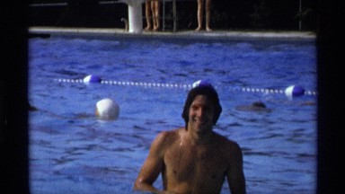 1971: A Young Man Swimming in a Clear Blue Pool New York