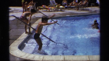 1971: the children swimming pool play morning time water blue steps steel wall
