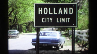 1969: sing board of holland city limits two different colored cars