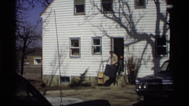 1966: the man transfer to somewhere from house by using car MADISON WISCONSIN
