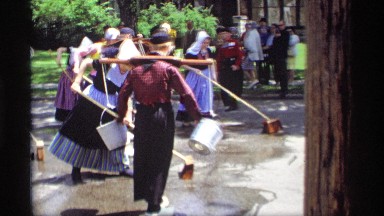 1969: people participating in ceremonial street-sweeping event HOLLAND MICHIGAN