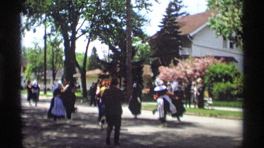 1969: beautiful are doing dance at the outside and it looks like a community