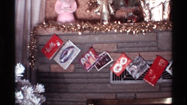 1968: a special and creative christmas garland made of photos and souvenirs