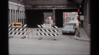1969: partitions, arrows and signs direct drivers to the left at closed road