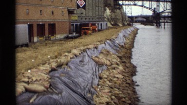 1969: shots of river near industrial shorelines in an urban area SAINT PAUL