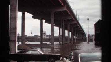 1969: bridge underpass becomes flooded with water blocking the road for cars