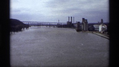 1969: a picturesque and beautiful view of a long steel bridge
