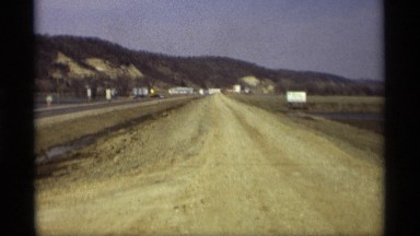 1969: two lengthy roads shown with natural activities and objects
