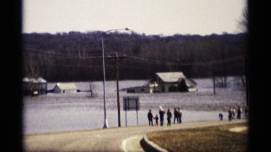 1969: the children and people the watching the huge water