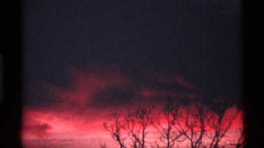 1968: angle of the low sun and clouds makes sky appear fiery and smoking CHICAGO