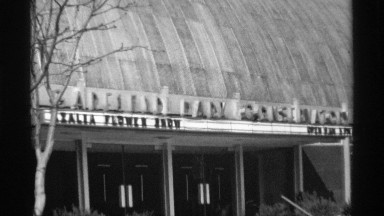 1968: A Grand Stone Building with Glass Doors Beside a Road in Chicago, Illinois