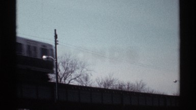 1968: a train that moves on the tracks with high speed at the early morning it's