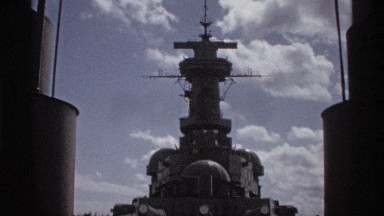 1974: a large ship that appears to be part a the united state military. SEATLLE