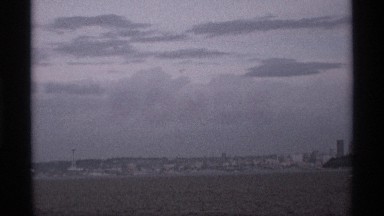 1974: a place at full of water and some pillar also there it looks like sunrise