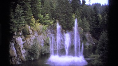 1974: beautiful cascading streams of water over a rocky hillside VANCOUVER