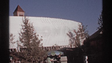 1974: a building and a small trees at the morning time in the sunshine time and