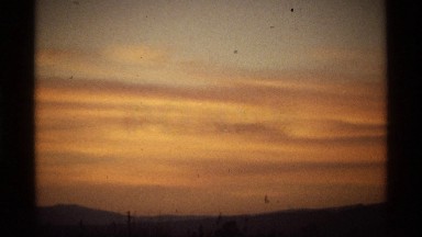 1974: still of a sun set in a meadow. WORLDS FAIR SEATTLE
