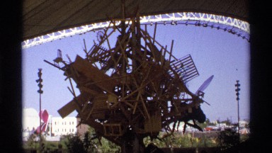 1974: a wastage of wooden objects are placed together at the ground or a garden