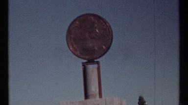 1967: a monument of a large coin held up on a pillar OTTAWA CANADA