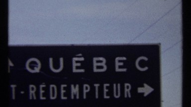 1967: Name of a Company or Organisation with Black Background and Arrow Markings