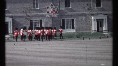 1967: english marching band parading on front an old building, OTTAWA CANADA