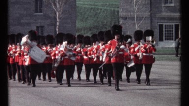 1967: the festival time people are walking with instrumental music at the road