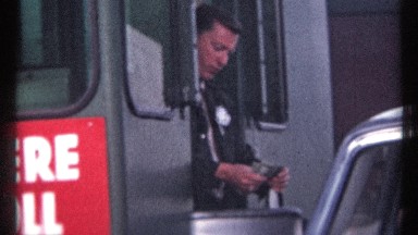 1967: a worker collecting some money from tickets and giving change OTTAWA