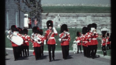1967: troops wearing the same clothing are walking on the concrete ground OTTAWA