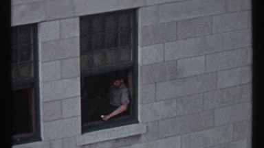 1967: watching a child on a typical day playing on a skyscraper's window OTTAWA