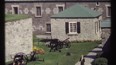 1967: People Walk Around Manicured Grounds With Historical Cannons In The