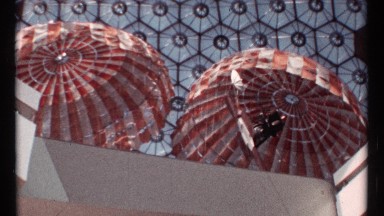 1967: two large dome shaped umbrellas on the roof with orange and white colors