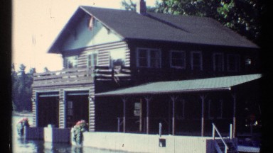 1967: a spanning shot of an old domicile that is built on water. TORONTO CANADA